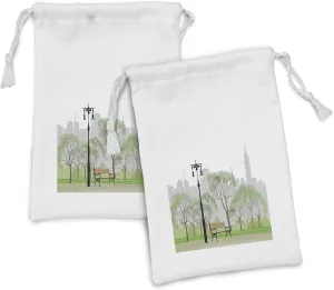 Lunarable New York Fabric Pouch Set of 2, Central Park Scene with Bench and Trees Skyscraper Silhouettes American Landscape, Small Drawstring Bag for Toiletries Masks and Favors, 9" x 6", Multicolor