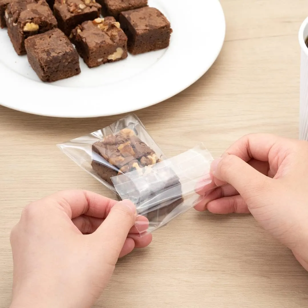 Restaurantware-5 x 3 Inch Treat Bags, 100 Microwavable Cookie Bags - Lip And Tape Design, Heat-Resistant, Clear Plastic Resealable Bakery Bags, Grease-Resistant, For Candy, Nuts, And Party Favors